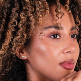 Woman wearing ear climber earrings