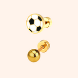 Gold earrings with soccer ball and plain ball design on a pink background