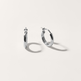 Everyday hoop hypoallergenic earrings in silver on white background