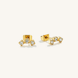 A pair of silver curved studs with 3 cubic zirconia pieces.
