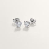 Love heart cubic zirconia hypoallergenic earrings in silver on white background