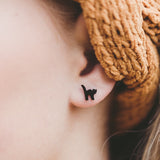 Black Cat Hypoallergenic Earrings in girls ear.