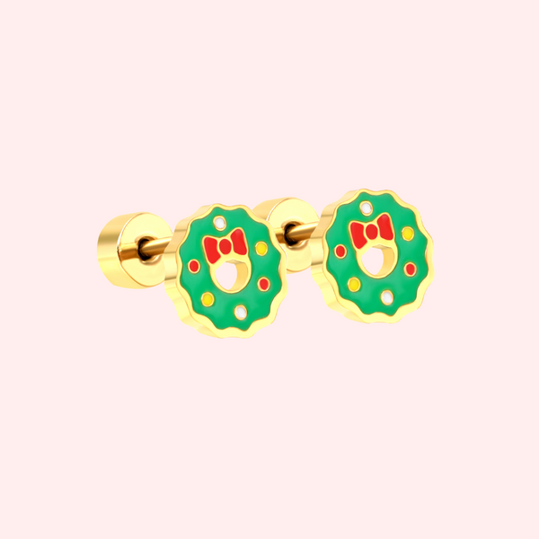 Gold wreath flat back earrings on a light pink background.