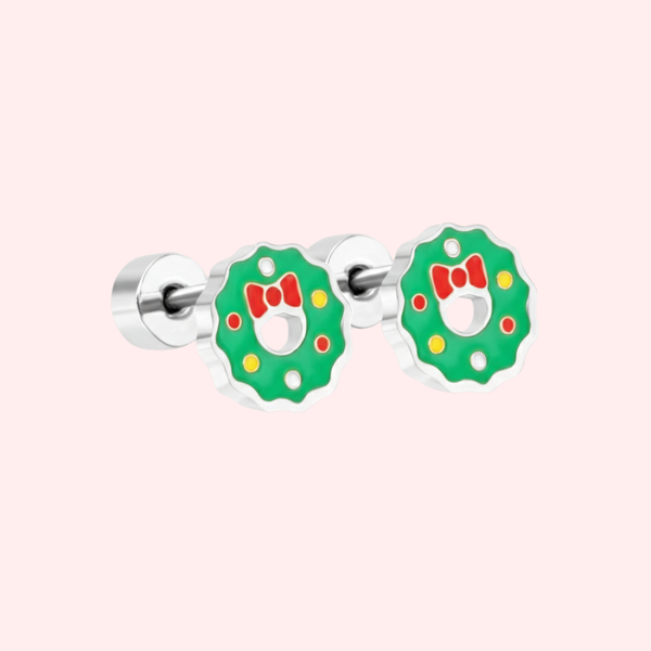 Silver wreath flat back earrings on a light pink background.