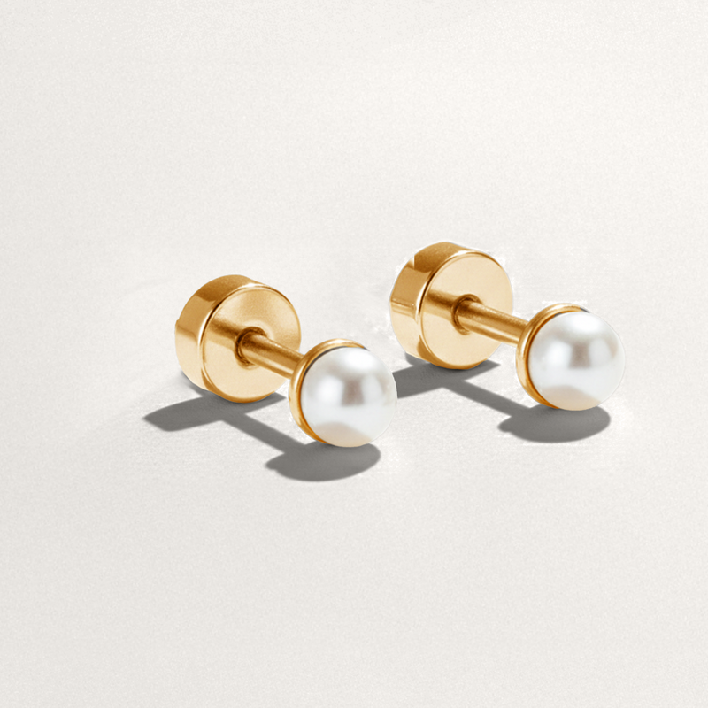 Classic white pearl bead hypoallergenic flat back earrings in gold on white background
