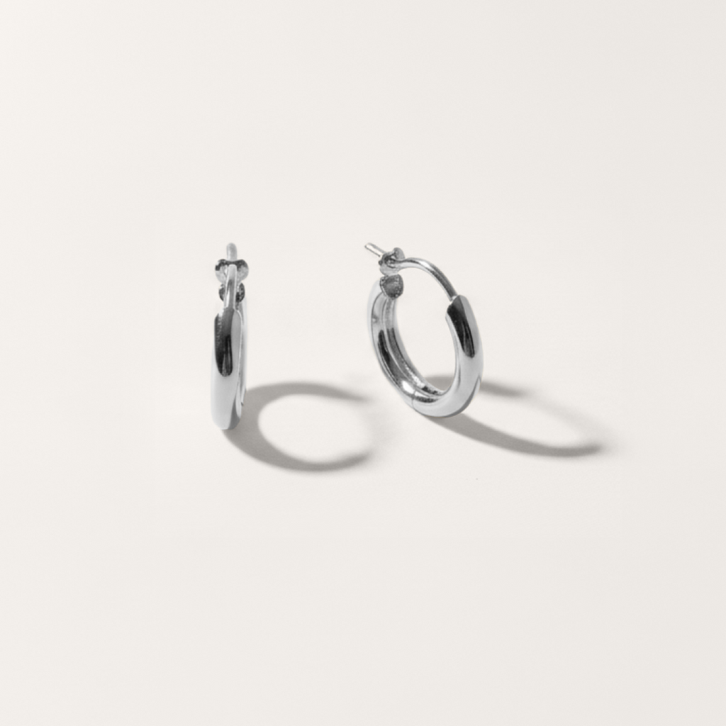 Everyday hoop hypoallergenic earrings in silver on white background