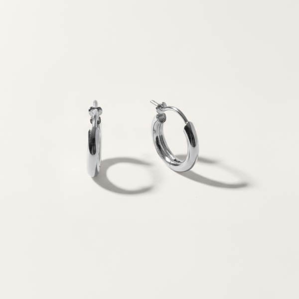 Everyday hoop hypoallergenic earrings in silver on white background
