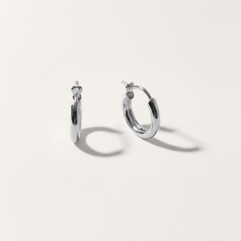 Everyday hoop hypoallergenic earrings in silver on white background
