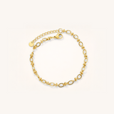 Gold bracelet on a white background