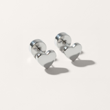 Heart flat back stud earring in silver on white background
