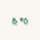 A pair of green heart flat back earrings made for kids.